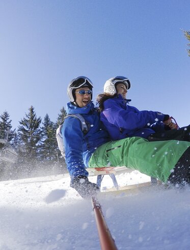 sledging man woman selfiestick fun  | © Ph. Paolo Codeluppi 